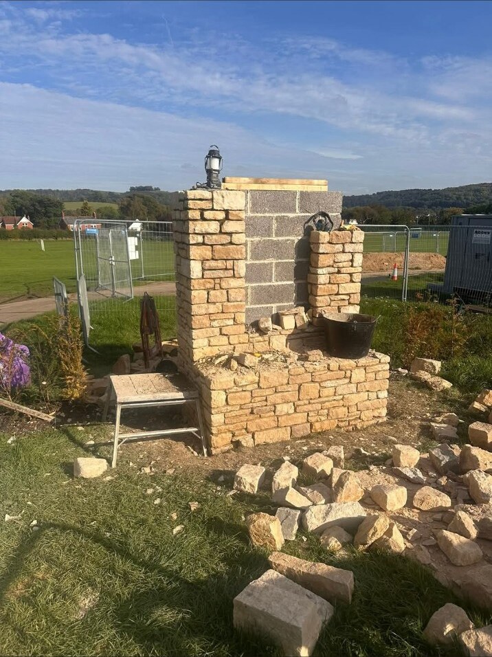 Stonework progressing around the structure