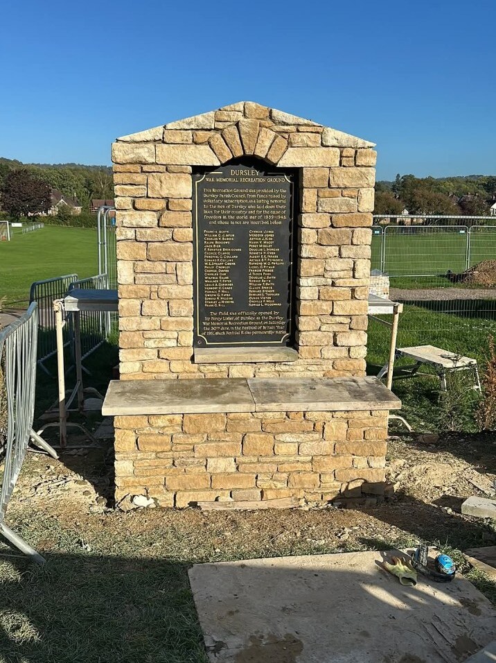 Memorial plaque fitted into completed stonework